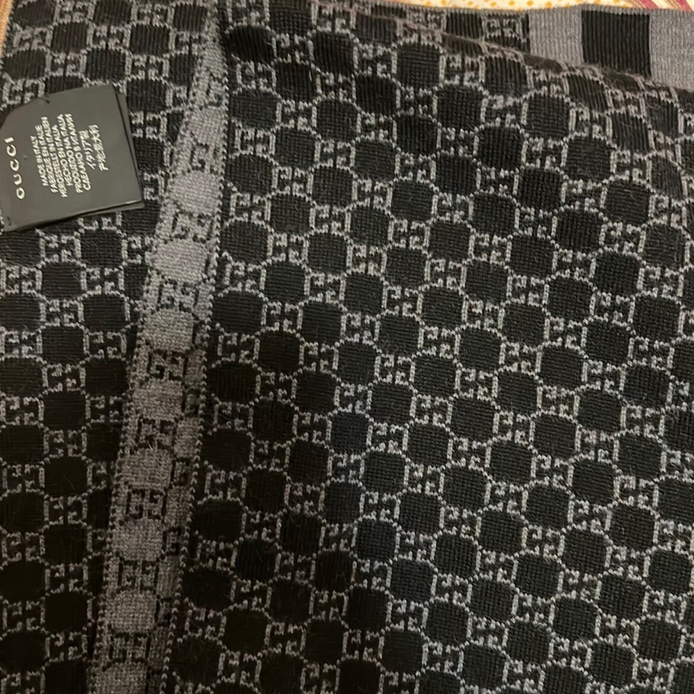 SOLD.       Gucci reversible wool scarf